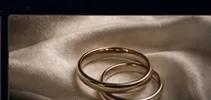 Wedding rings on fabric as wedding gift inspiration