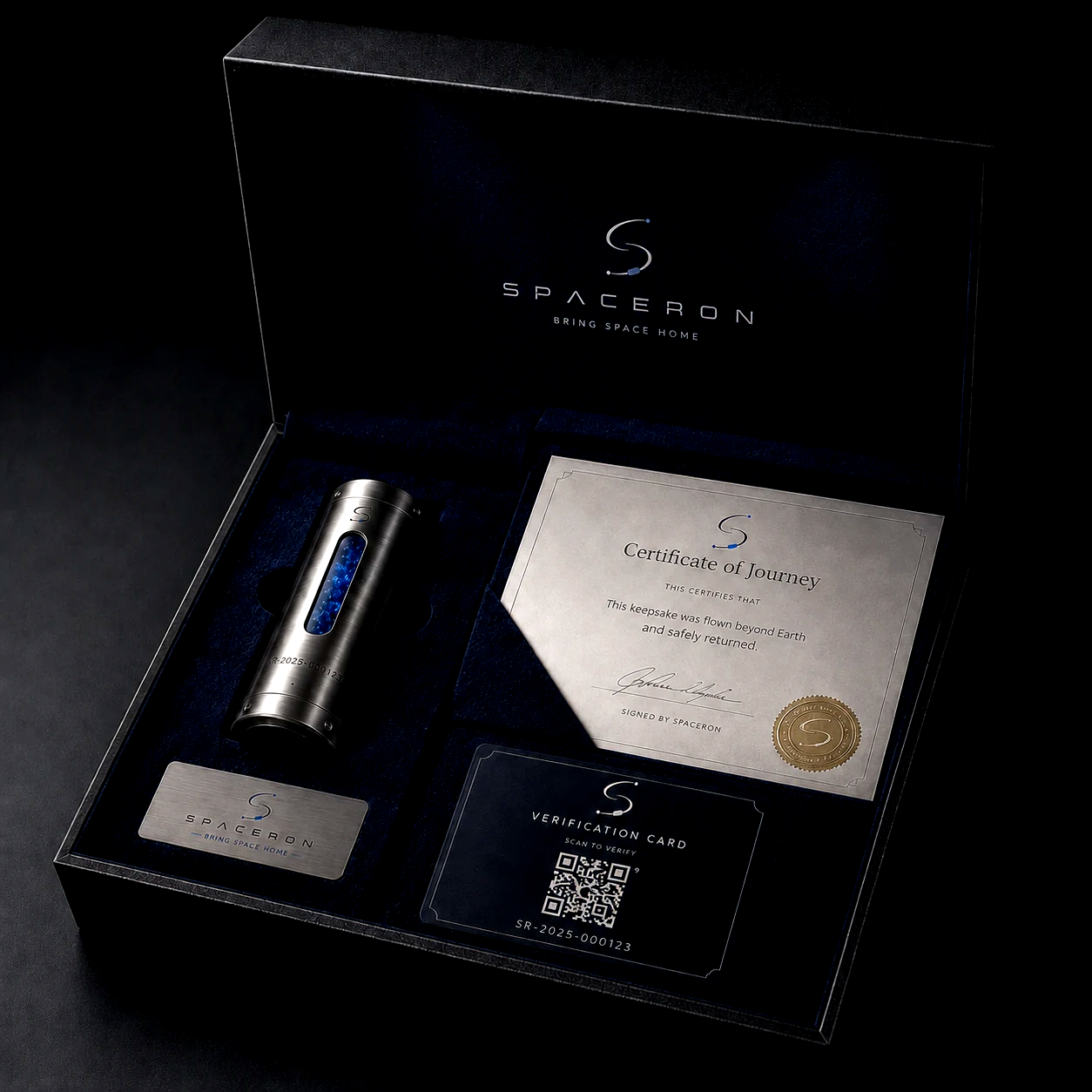 Open Spaceron journey kit with capsule, certificate, metal card, and verification card
